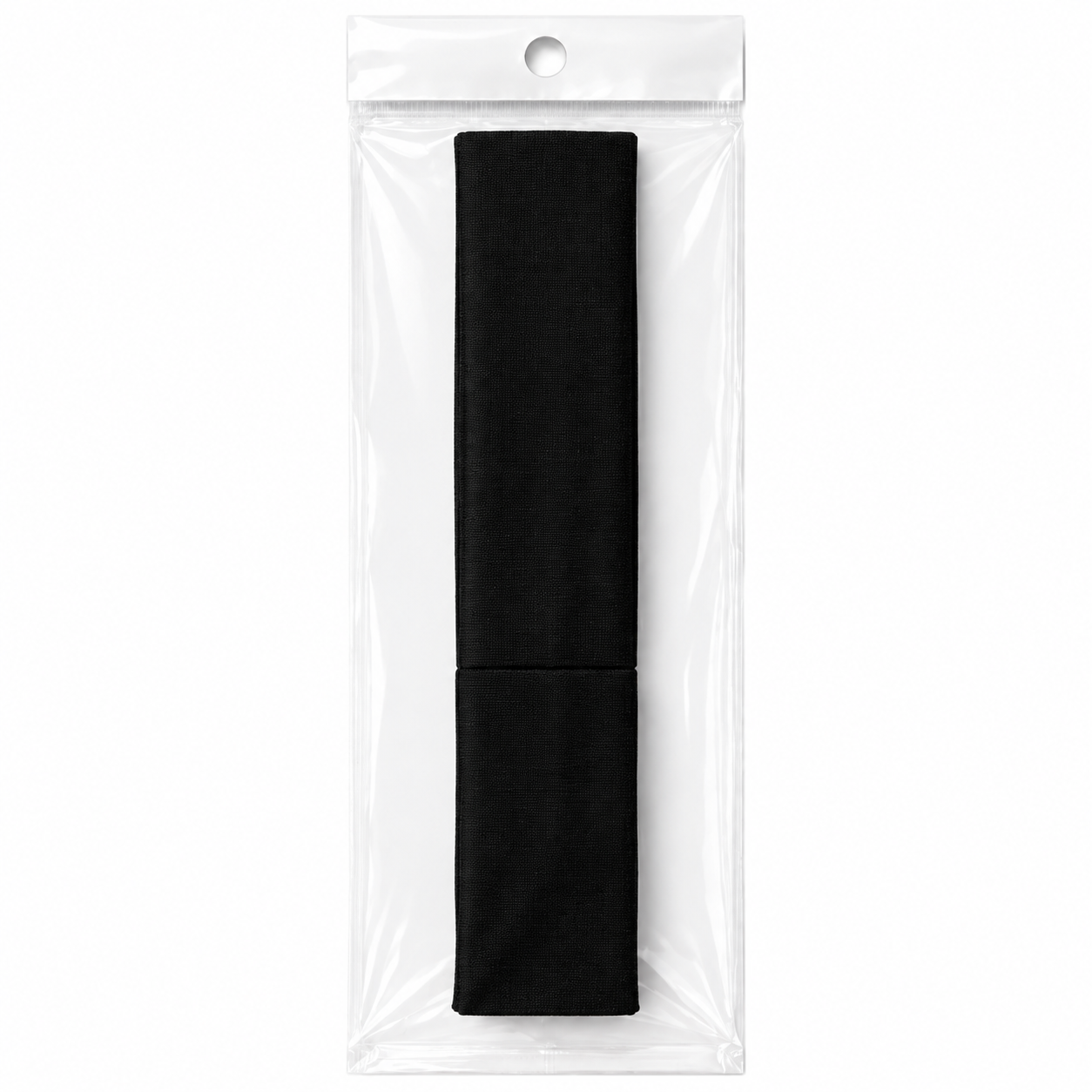 Black fabric hair band in clear plastic packaging on white background