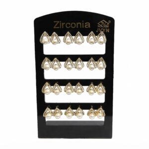Leaf shaped earrings with pearls on a display card