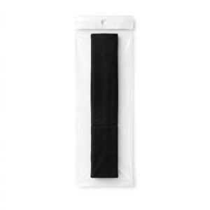Small black cotton headband in packaging