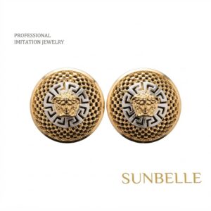 Gold Medusa earrings by Sunbelle, showcasing unique design.