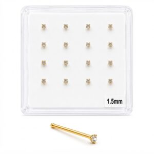 Small gold nose studs with sparkling stones, ideal for body piercings.